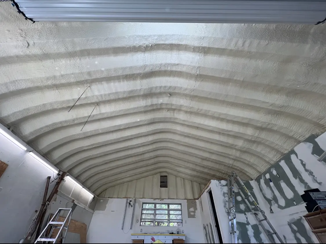 Spray polyurethane foam applied to the underside of a metal roof deck in Morristown